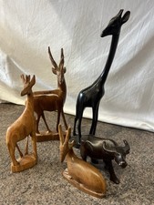 A set of vintage, hand-carved