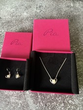 Pia Matching Silver And Pearl Necklace And Earrings