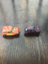 Matchbox Superfast No 29 Racing Mini Orange and Corgi Whizzwheels Mini Cooper S