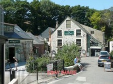 PHOTO  THE TOWN MILL LYME REGIS. OLD WATERMILL WITH WORKING WATER WHEEL NOW CONV