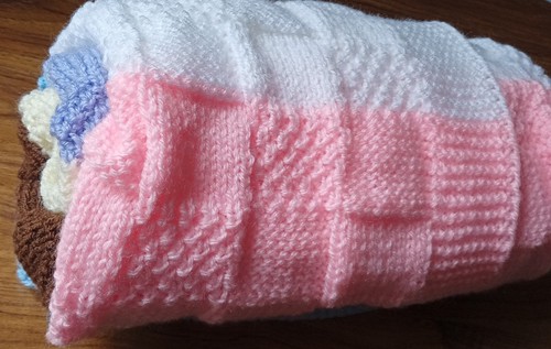 Hand knitted baby - hand, blanket