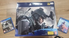 Sony PS4 Pro 1TB Console Bundle - Black with 2 games, 1 controller & charger. 
