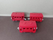 Three Red Brake Vans Cabooses