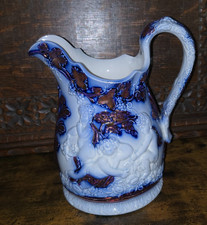 Victorian Ynysmeudwy Swansea, Wales, Pottery Flow Blue Copper Lustre Cherub Jug