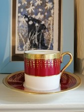 Aynsley Coffee Cup and Saucer , red and gold .