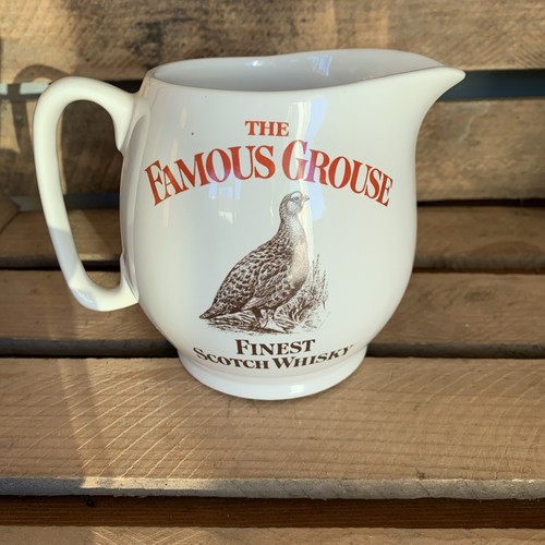 The famous grouse scotch - the,