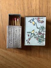 two matchbox holders