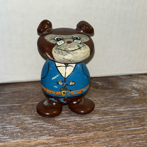 Painted stone figure dog - on,