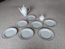 White China Teapot, Sugar Bowl And 7 Matching Plates