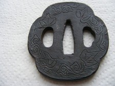 AN ANTIQUE MOKKO STYLE JAPANESE TSUBA FOR A KATANA