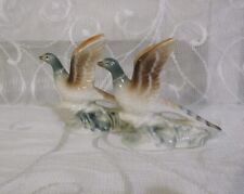 A Pair Of Miniature Porcelain