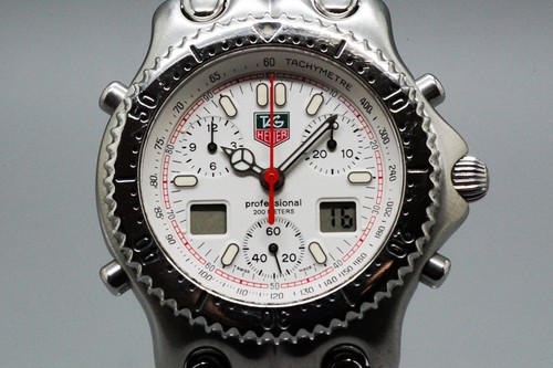 Near mint tag - heuer, sel