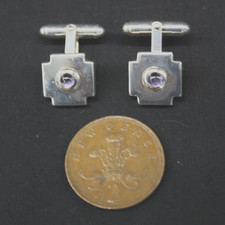 A pair of square Links of London silver with amethyst(?) centre stone cufflinks