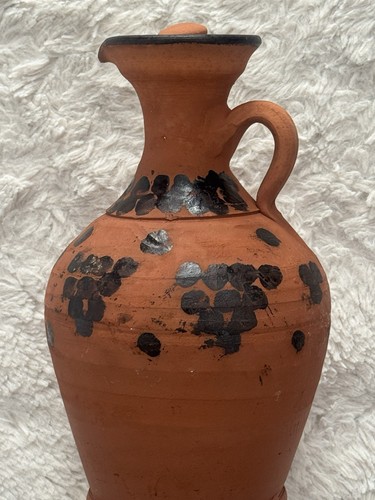 Terracotta clay jug with - clay,