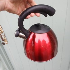 Red 'Benzer' brand whistling stove top kettle