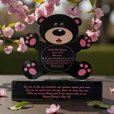 Baby girls Teddy On A Plinth