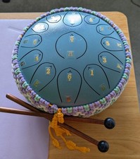 Steel Tongue Drum with hand