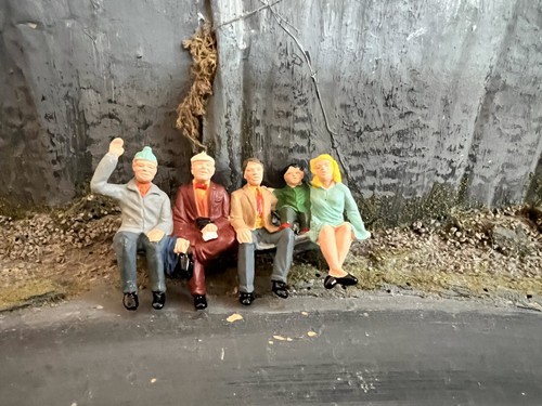 Painted seated spectators - painted,