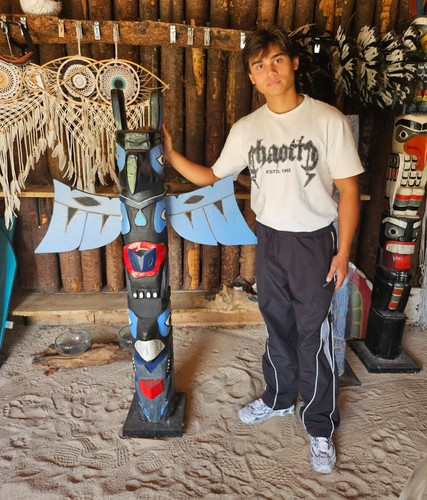 Totem pole torture wood - pole,