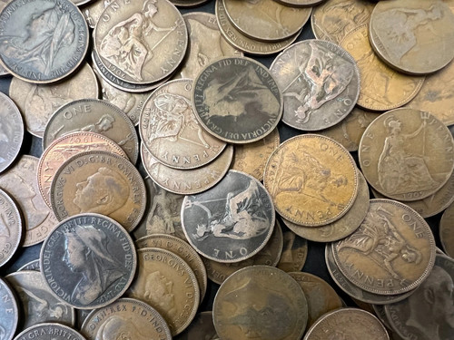 Old one penny coins - one,