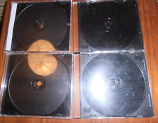 4 CD Cases Jewel Cases 1 disc each  used with black trays. 2 slimline 2 standard