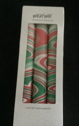 Hand dipped taper - hand,