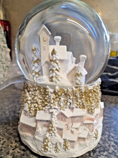 Gisela Graham Village Scene Light Up Musical Christmas Snow Globe in Gold/White
