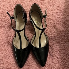 Lotus black patent heels