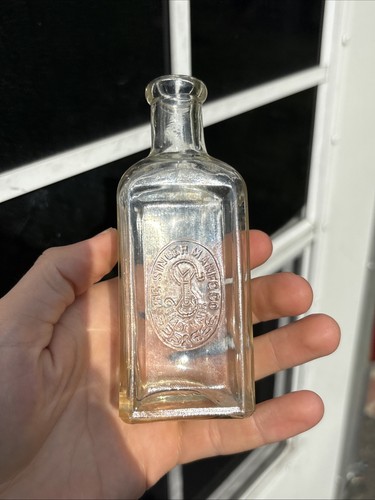 Singer sewing machine bottle - machine,