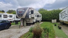 2014 Palamino Sabre, American 5th Wheel caravan, Rear kitchen, Triple slide.