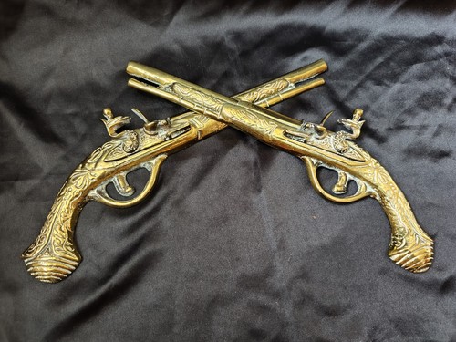 Brass flintlock ornamental - brass,