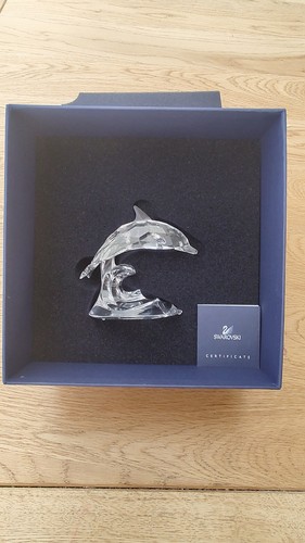 Swarovski dolphin wave - on, a