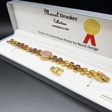 Marcel Drucker Gold Tone Red