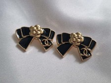 LOT OF TWO CHANEL BLACK ENAMEL