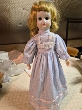 Large porcelain doll in good condition. 