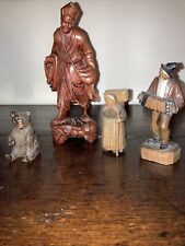 A Group Of Folk Art Wooden