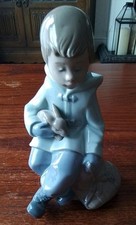 Nao By Lladro Sitting Boy With