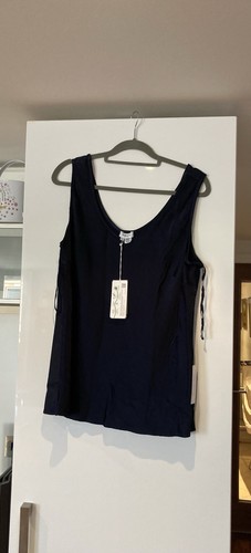 Sleeve less top - sleeve, in.