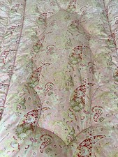 A single vintage eiderdown in