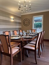 Solid Teak Dining Table & Chairs. Excellent condition.  Tableware Not Included