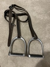 Stirrups And Brown Stirrup Leathers 