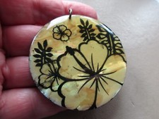 VINTAGE RETRO LARGE SILVER TONE PLASTIC LUCITE BLACK ENAMEL FLOWER MOTIF PENDANT