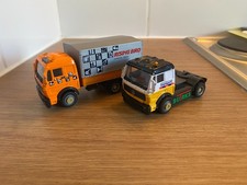 Diecast Hongwell 2x Mercedes-Benz Trucks Rising Bird/Racing Truck 1:36? (FLAWED)