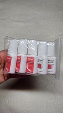Press on nail GLUE. Brush on.