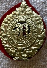 Vintage military cap badge for