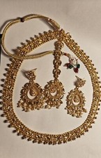 Women Gold-plated pearl Necklace Set including earrings and Tika.