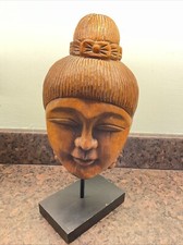 Buddah head on plinth 