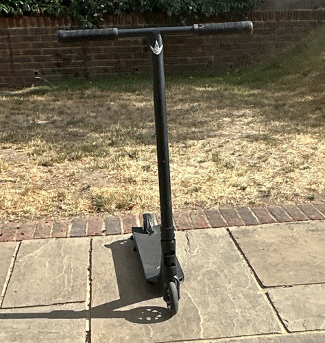 All black colt push scooter