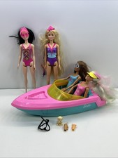 Barbie Boat & 4 Barbie dolls