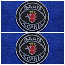 A Pair Of Motor Car Racing